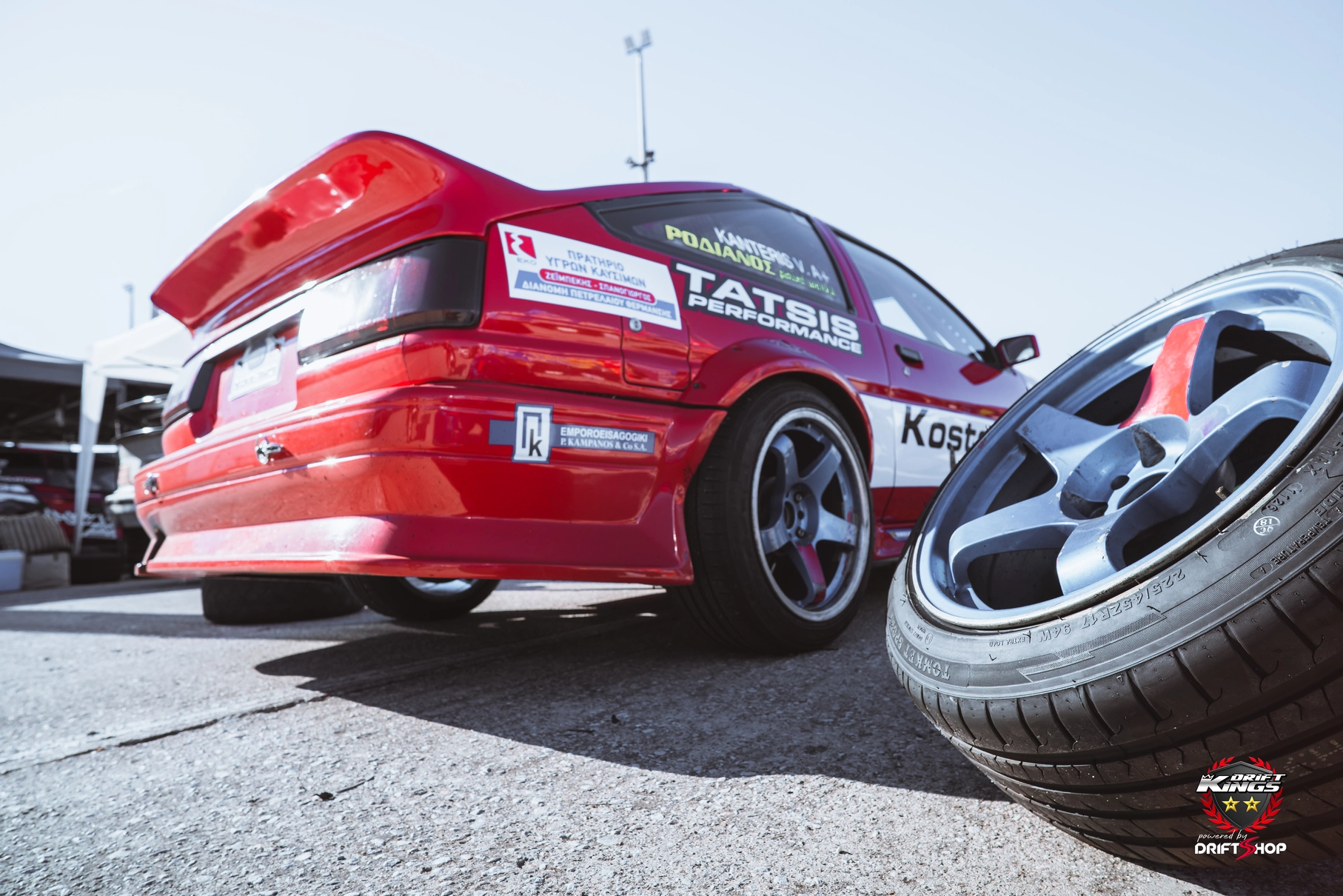 Konstantinos Bouzalakos’s red BMW and spare wheels in the Serres paddock
